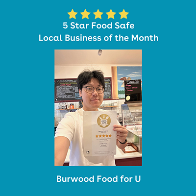 Burwood Food 4 U owner holding their 5 star business of the month award