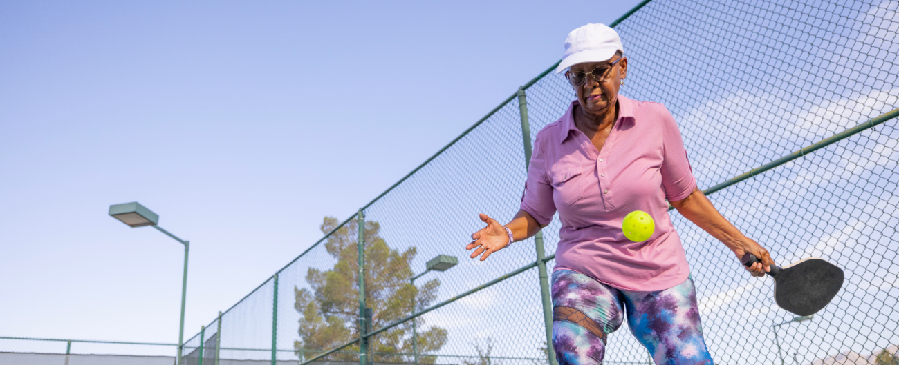 woman playing pickleball