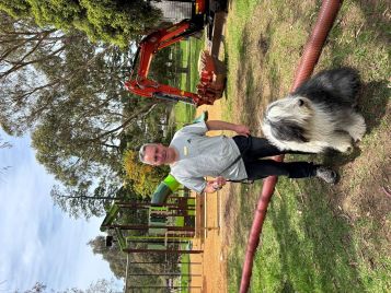 Cr Blair Barker and his dog Paddy at the Crocodile playground.