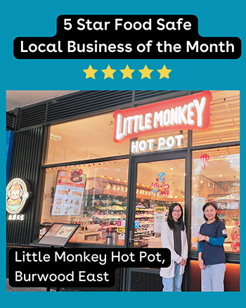 Little Monkey Hot Pot shop front with the owners standing out the front
