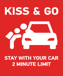 a red sign reading kiss and go