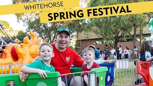 Dad and 2 children in tea cups ride