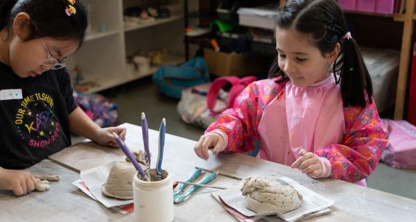 Kids creating with clay
