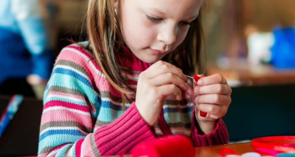 girl stitching 