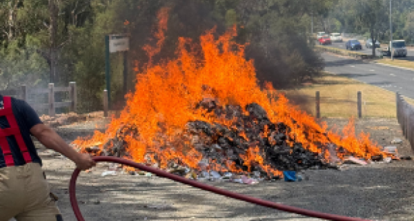 An image of recycling on fire