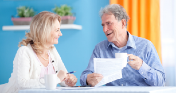 Couple reading a bill