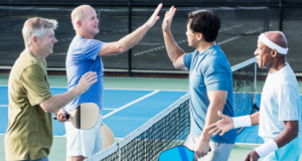Men playing pickleball