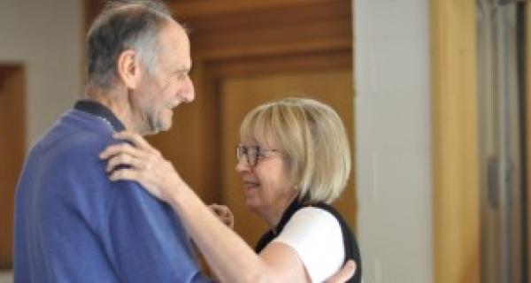 senior man and a woman dancing