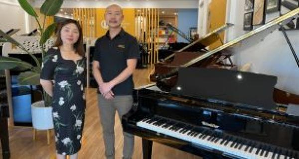 two people in a music store
