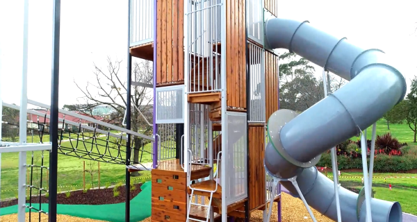playground with climbing frame and slide