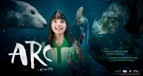young child smiling at the camera with images of animals behind her with ARC logo in left bottom corner