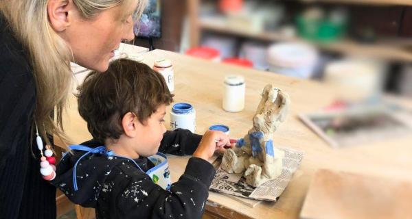 Families creating with clay 