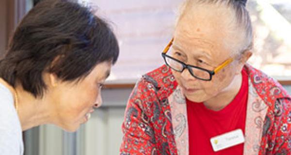 2 ladies concentrating