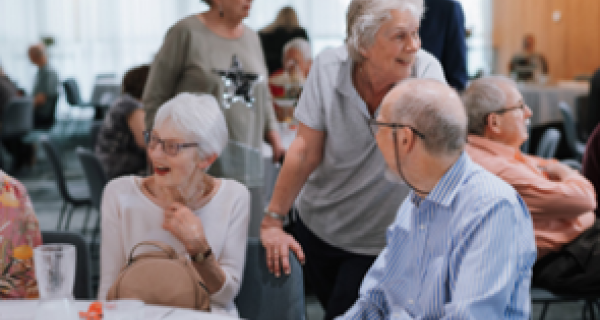 Forum - people chatting at table