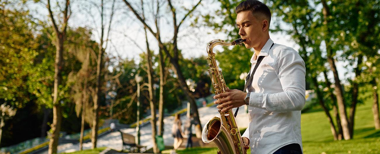 man playing a saxaphone