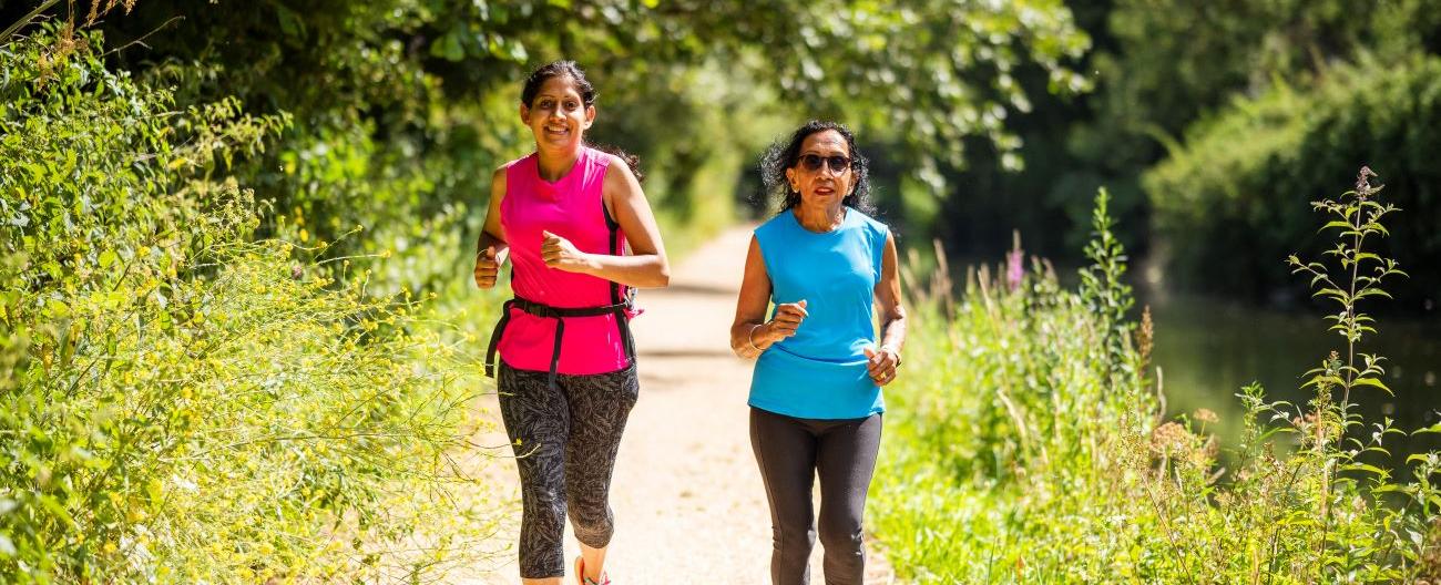 two women running